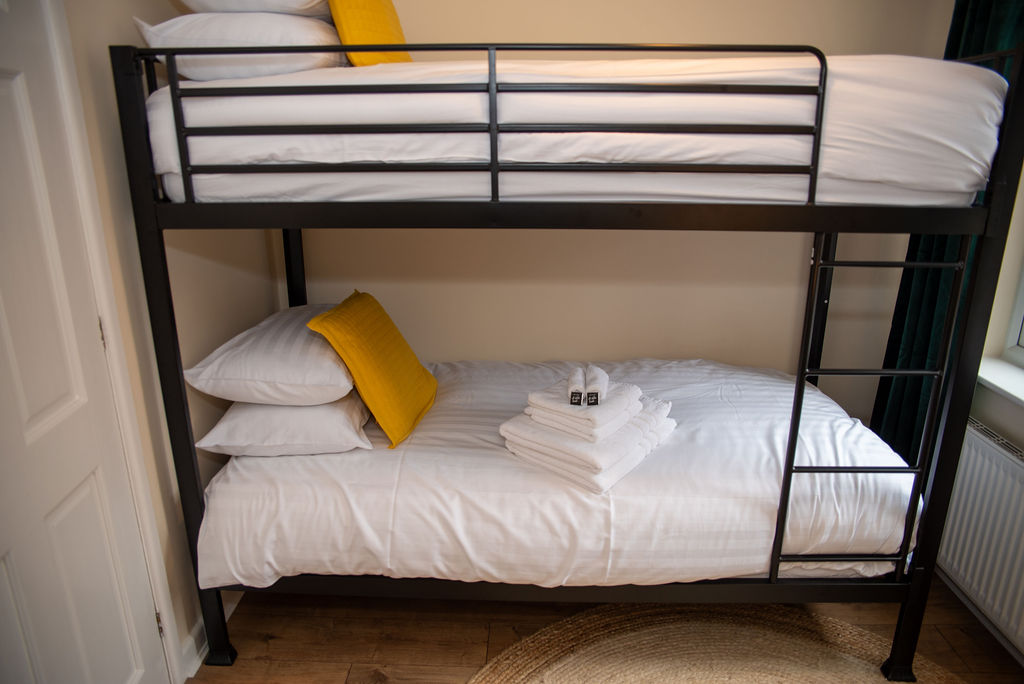 Bedroom 4 adult bunk beds with hotel-quality linen and towels