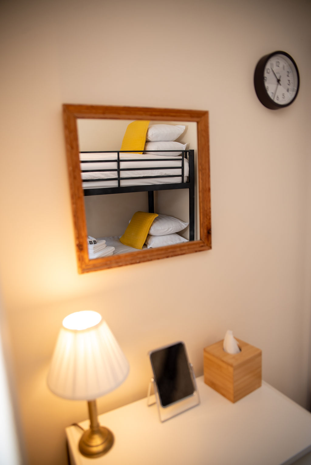 Bedroom 4 mirror reflection showing bunk beds and desk