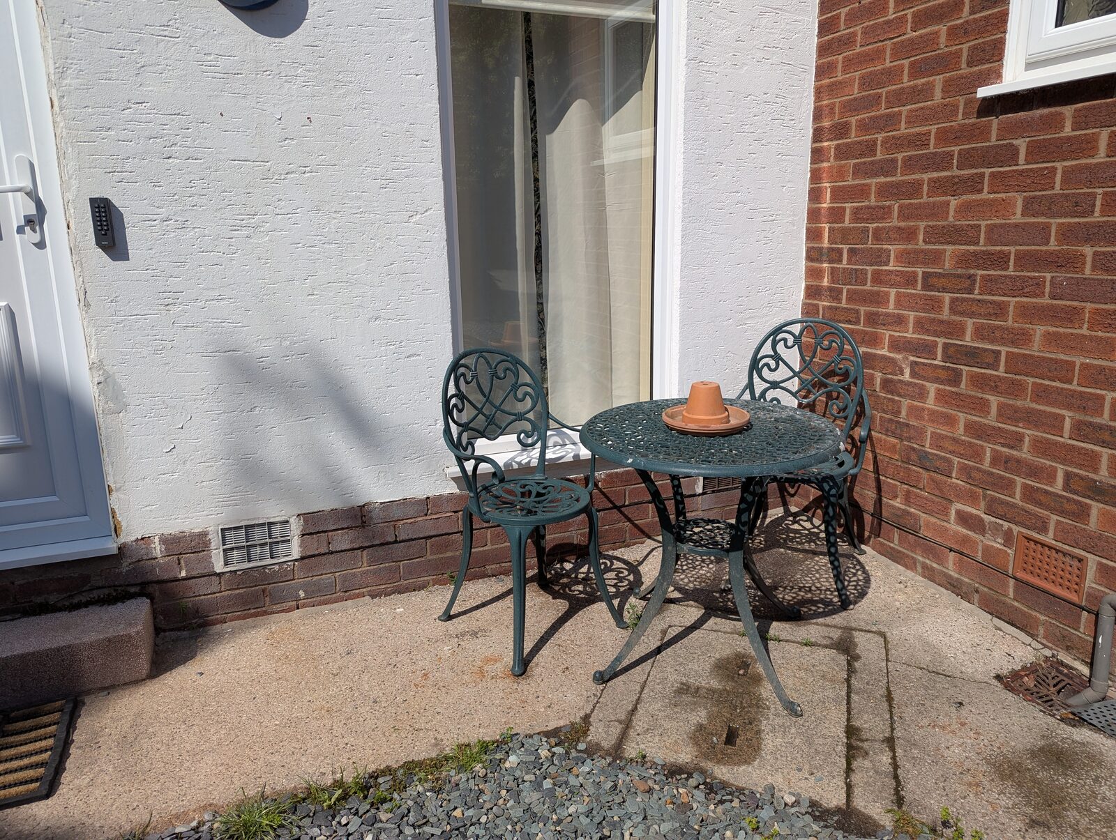 Table and chairs by back door