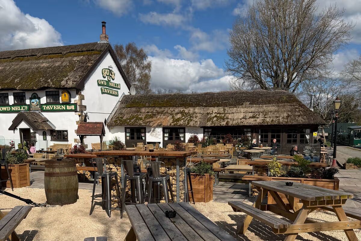 'Owd Nell's Tavern at The Thatched Hamlet, with new outdoor seating on the terrace under spring sunshine