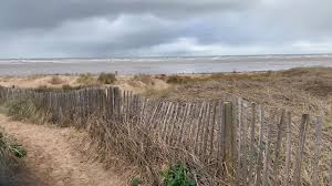 Sand dunes and beach at St Annes-on-the-Sea, looking out towards the Irish Sea