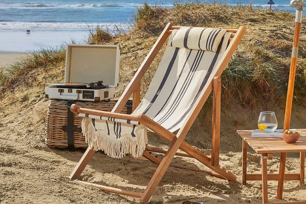 Picture of a deck chair on a beach, illustrating an article about bank holidays in 2025